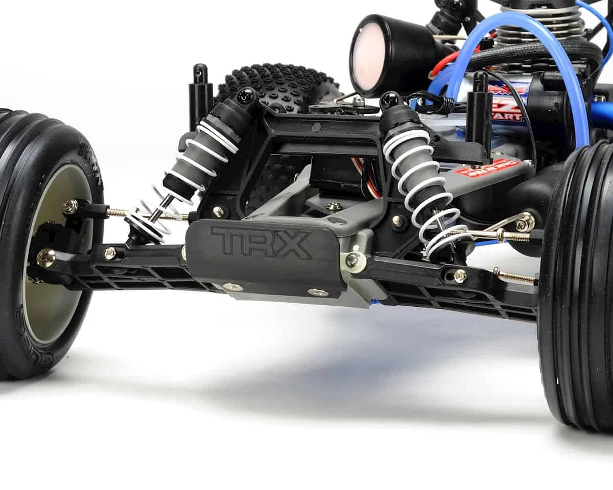 Traxxas Nitro Rustler: 1/10-Scale Nitro-Powered 2WD Stadium Truck Silver/Red 6 Traxxas Nitro Rustler: 1/10-Scale Nitro-Powered 2WD Stadium Truck Silver/Red - Image 4