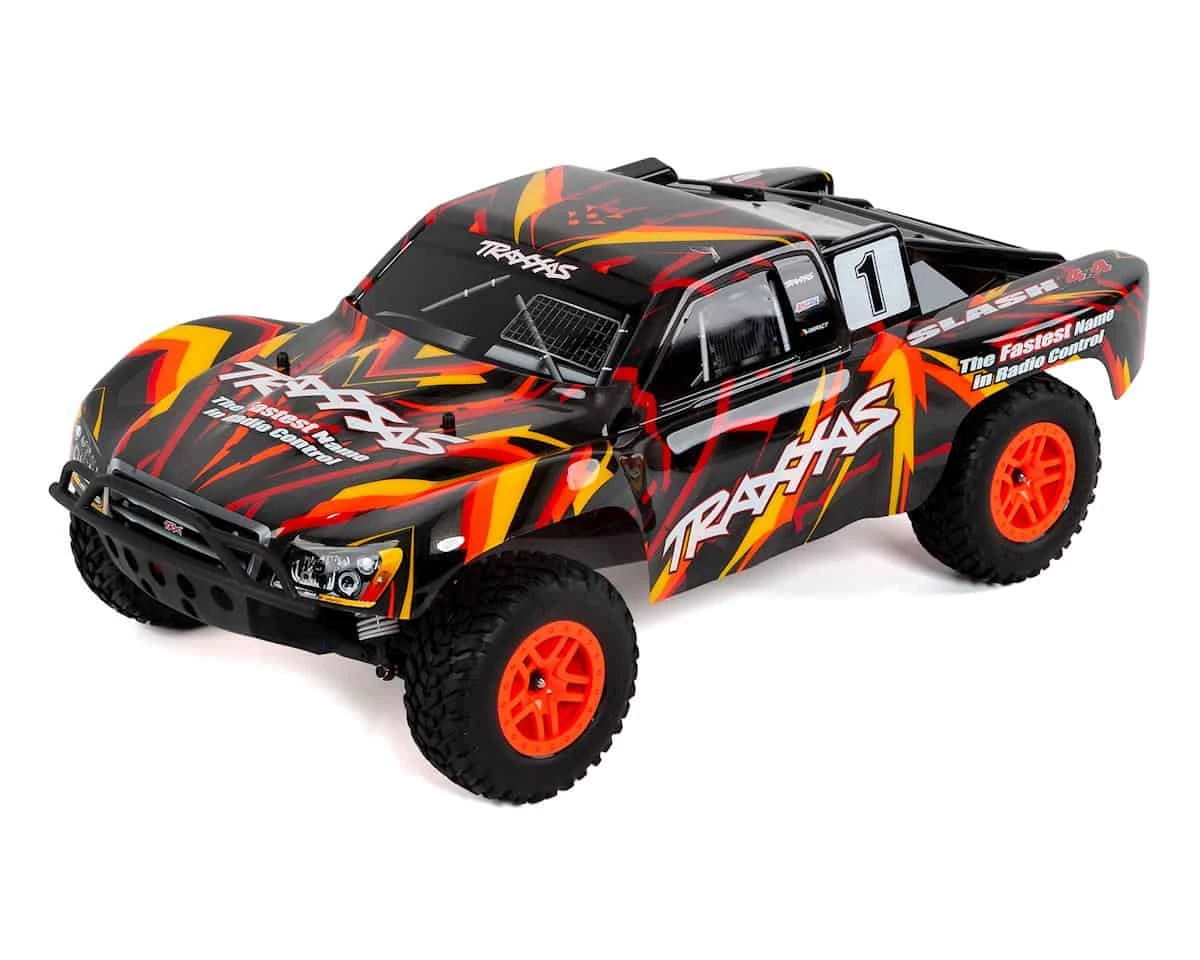 Traxxas Slash 4X4: 1/10 Scale 4WD Electric Short Course Truck with Battery and Charger Orange 3 Traxxas Slash 4X4: 1/10 Scale 4WD Electric Short Course Truck with Battery and Charger Orange